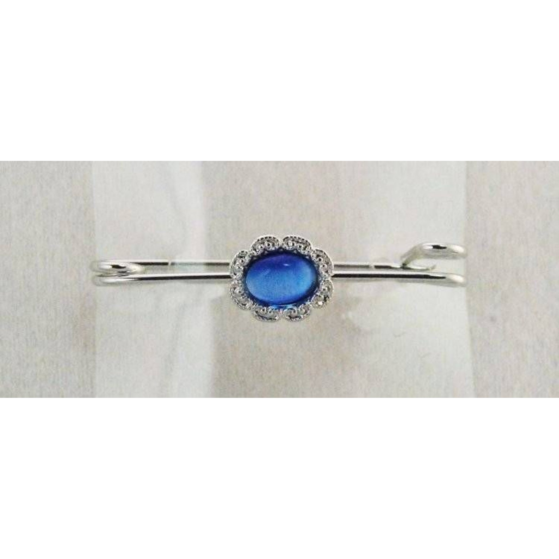 Finishing Touch Lt Sapphire Cats Eye Stock Pin